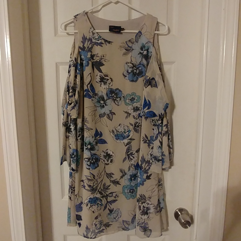 Cream dress with blue flowers